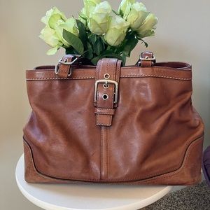 Vintage, supple tan leather top handle bag from Coach.